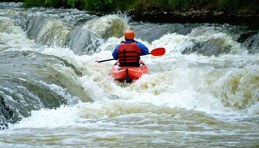 Adventurous kayakers tackling Class III rapids on Ontario's Ottawa River